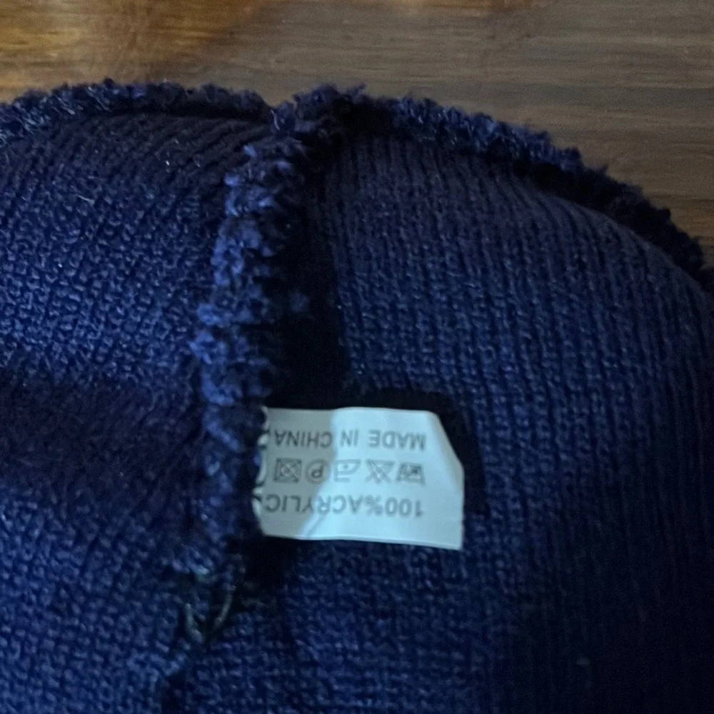 New hat with Grudens label.